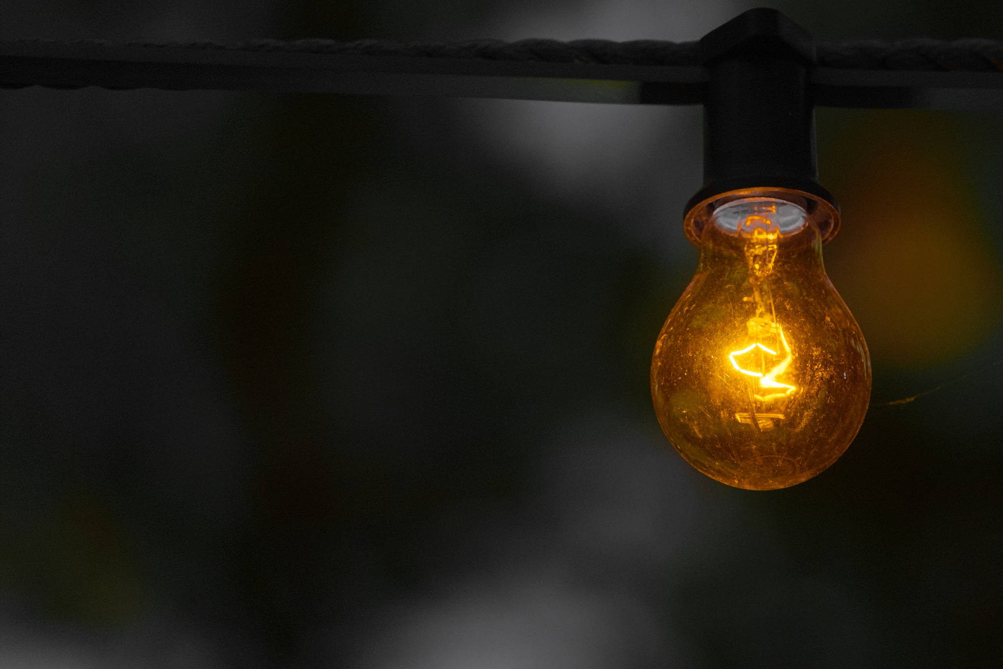Yellow Bulb on Dark Background